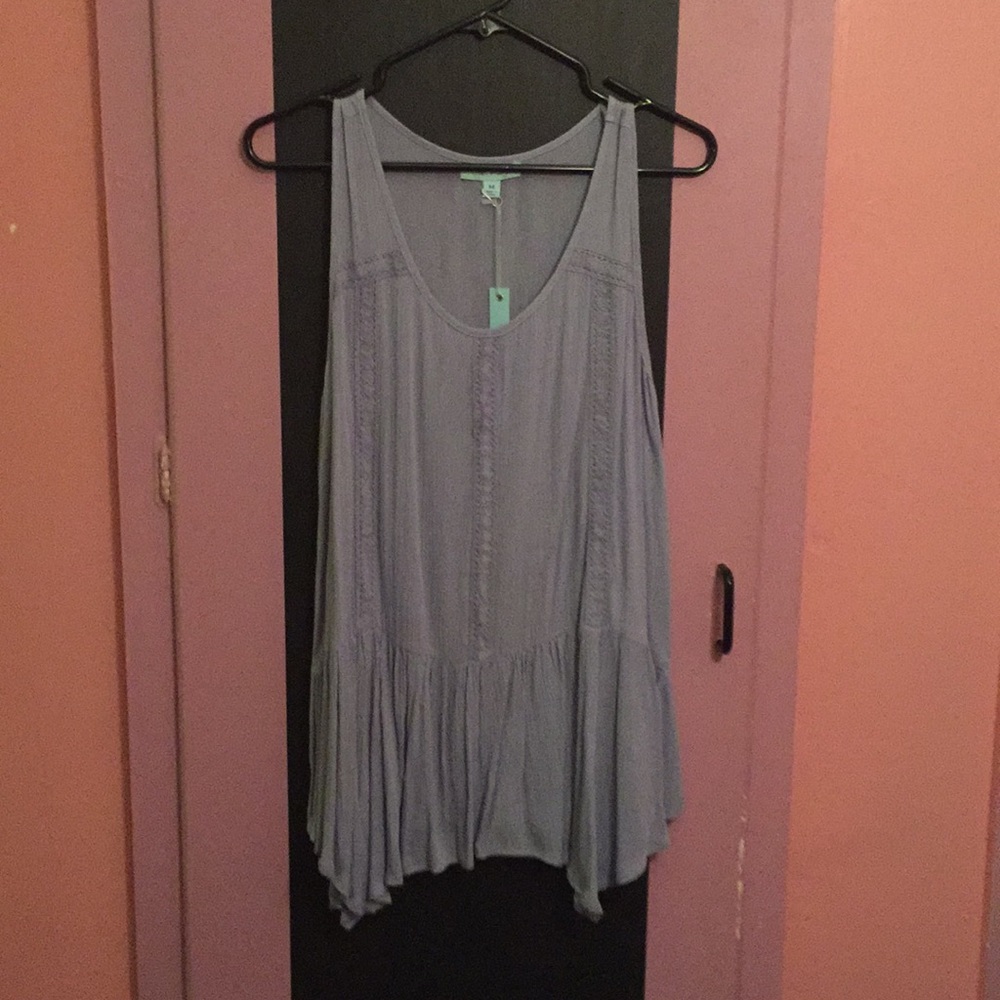 Light blue long blouse with lace detailing.
